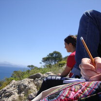 CYA students doing work by the sea