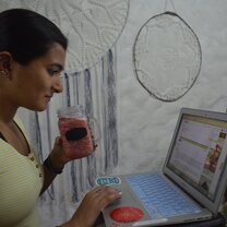 girl studying at desk on laptop