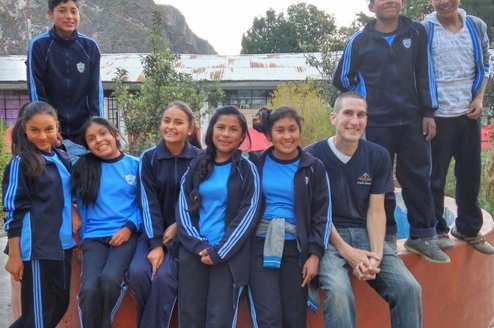 Volunteer Greg with his students